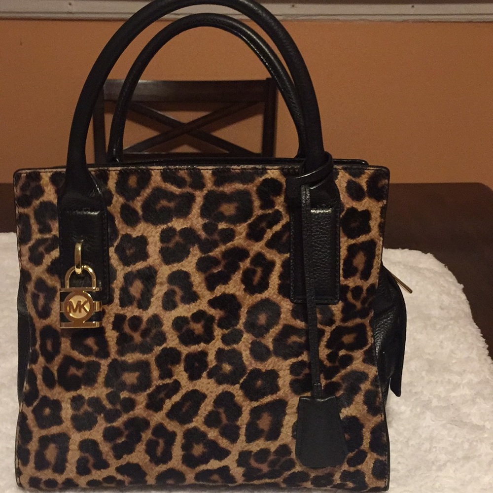 MK animal print faux purse gentlty used no tears
